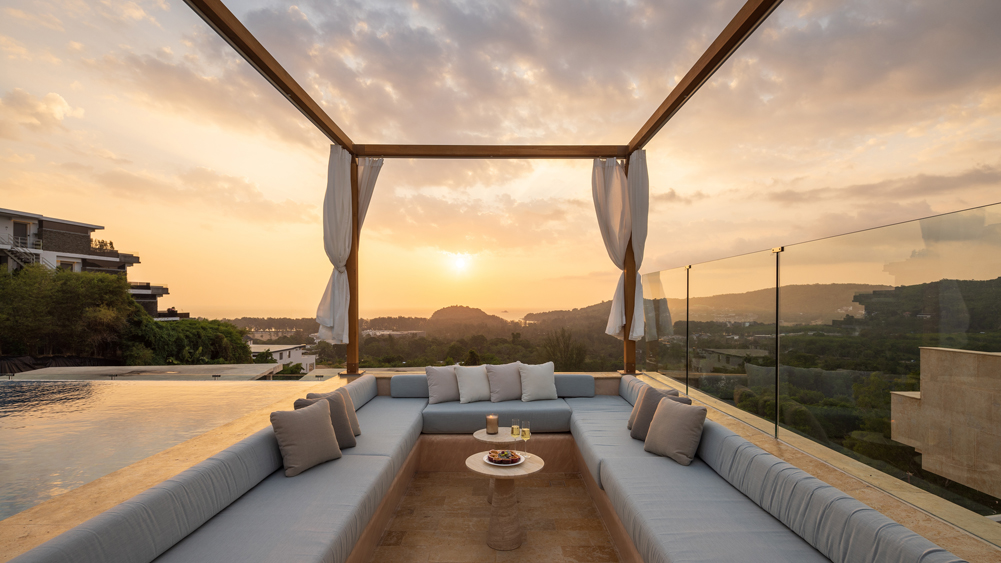 Elite Havens - Cohiba Sea View Villa 8 - Modern tropical hilltop luxury villa - Outdoor sala overlooking the breathtaking sunset